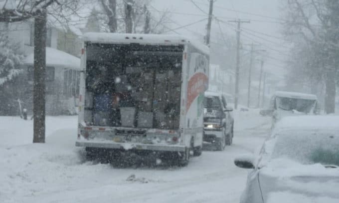 Strategies for Moving During the Wintertime Real Estate Times moving in wintertime picture of truck moving in wintertime