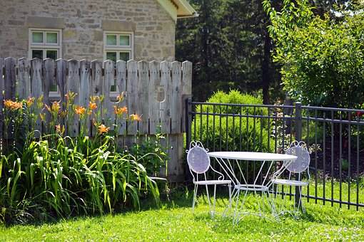 A fence immediately adds to your backyard privacy